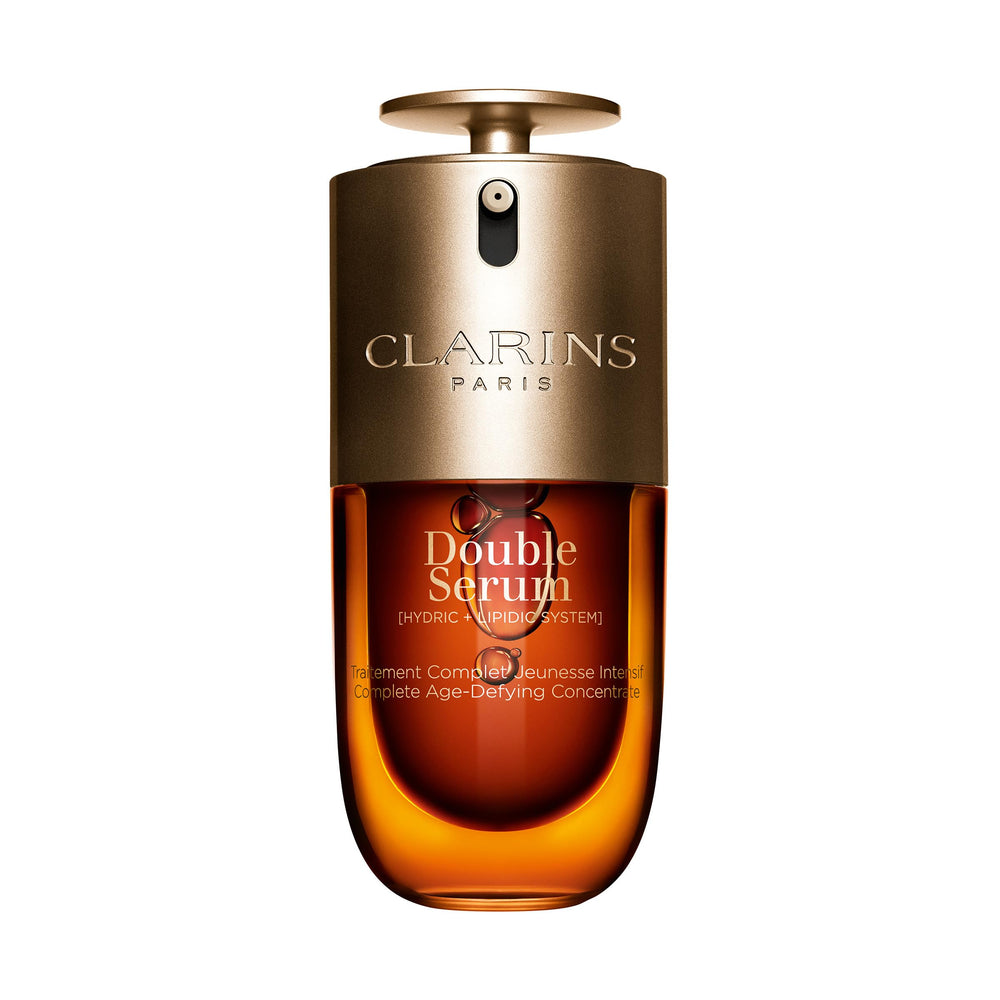 Clarins Double Serum bottle close-up showing luminous hydration for daily skincare.