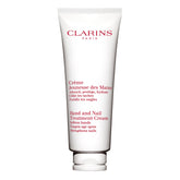 Clarins Hand and Nail Treatment Cream closeup of the tube showing a silky, hydrating formula.
