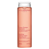 Clarins Soothing Toning Lotion bottle pour shows a gentle, alcohol-free skin refresh.