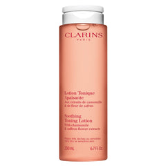 Clarins Soothing Toning Lotion bottle pour shows a gentle, alcohol-free skin refresh.