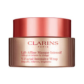 Clarins V-Facial Intensive Wrap Mask jar close-up showing cream-mousse texture for puffiness relief