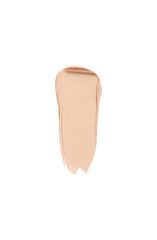 Clé de Peau Beauté Concealer SPF 27 Ivory creamy texture for easy application.