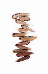 Clé de Peau Beauté Concealer SPF 27 Ivory on textured skin for seamless wear.