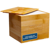 Clean Skin Club Luxe bamboo container on a bathroom counter with removable cover