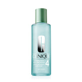Clinique Clarifying Lotion 4 bottle pour demonstrates oil-control benefits for oily skin.