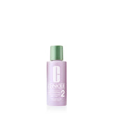 Clinique Clarifying Lotion bottle closeup showing exfoliating action