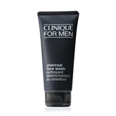 Clinique For Men Charcoal Face Wash bottle on bathroom shelf for daily detox.