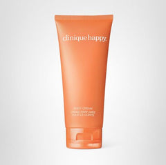 Hands apply Clinique Happy Body Cream to achieve soft, lightly scented skin
