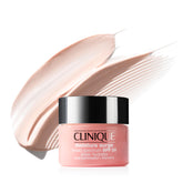 Clinique Moisture Surge SPF 28 bottle demonstrates sheer hydration for all-day glow.