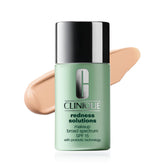 Clinique Redness Solutions foundation bottle closeup showing color correcting pearls for redness-prone skin.