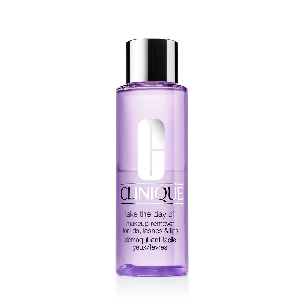 Clinique Take The Day Off bottle close-up highlights oil-free makeup remover for sensitive eyes