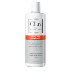 CLn Shampoo bottle pour shows easy application for a clarifying cleanse on an oil-prone scalp.