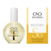 CND SolarOil bottle applying to nails and cuticles for hydration.