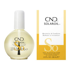 CND SolarOil bottle applying to nails and cuticles for hydration.