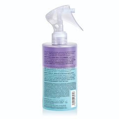 COLOR WOW Curl Wow Shook bottle pouring two-part formula for hydration.