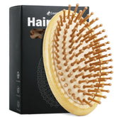 Combetter handleless bamboo hair brush showing ergonomic palm fit for easy styling
