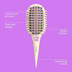 Conair Curl Define Pro detangler brush dual-vent closeup showing grooves