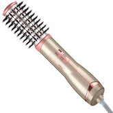 Conair INFINITIPRO Frizz Free hot air brush in action for smooth, voluminous styling.