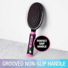Conair Salon Results Hairbrush in pink and black shows ergonomic grip for comfortable styling.