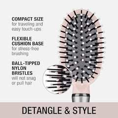 Close-up of the soft-touch handle on the Conair Velvet Touch Brush for comfortable styling.