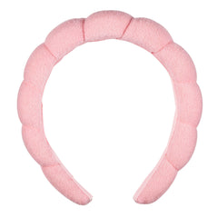 Conair Spa headband with pink bubble design for makeup and facial cleansing.