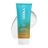 COOLA Organic Sunscreen SPF 30 body lotion bottle with tropical coconut aroma for daily protection.