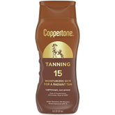 Coppertone tanning sunscreen lotion SPF 15 bottle showcases light coverage for non-greasy skin