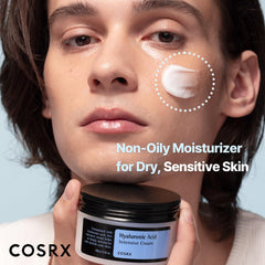 Applying COSRX cream on the face for quick absorption and plump look