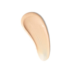 Swirl of tinted cream on skin highlights light natural finish