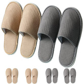 COZYAREA spa slippers with a soft polar fleece upper for guest comfort.
