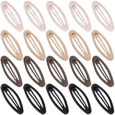 Cptots oval snap clip in matte black secures fine hair securely.