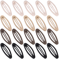 Cptots oval snap clip in matte black secures fine hair securely.