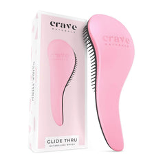 Crave Naturals Glide Thru Brush front view in pink, a gentle detangler for all hair types.
