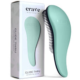 Crave Naturals Glide Thru Detangling Brush turquoise close-up for smooth glide through knots.