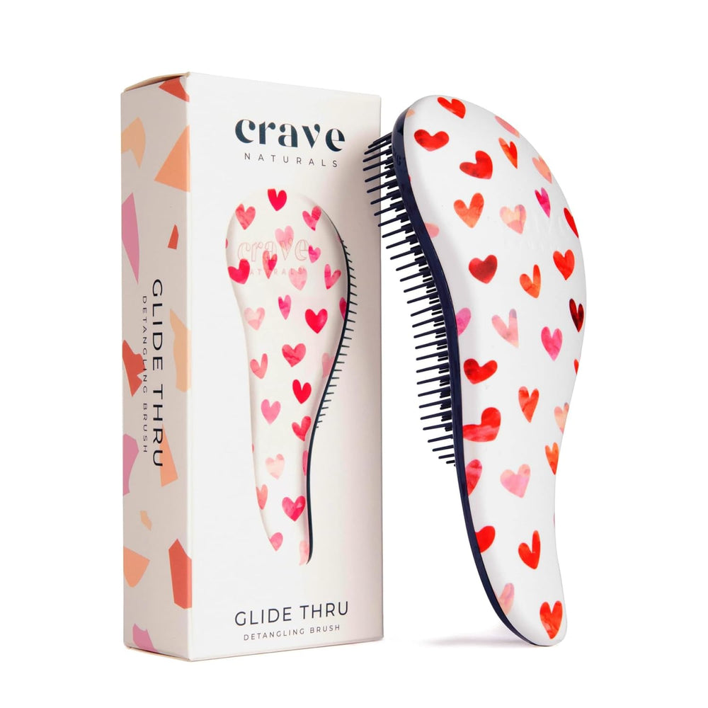 Crave Naturals Glide Thru brush with pink hearts, gentle detangling for all hair types.