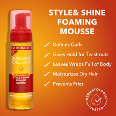 Creme of Nature frizz-control mousse smoothing dry hair for a sleek finish
