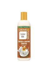 Creme of Nature Leche de Coco Desenredante: acondiciona rizos para un peinado suave y manejable.