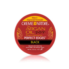 Creme of Nature Perfect Edges bottle being applied for a sleek, long-lasting hold.