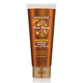 Creme of Nature Pure Honey activador-rizos define rizos con brillo suave.