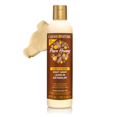Creme of Nature Pure Honey Knot Away detangler in action detangles thick curls with ease.