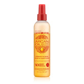 Creme of Nature Strength & Shine Leave-In bottle pour for easy, lightweight moisture.