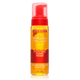 Creme of Nature Style & Shine Foaming Mousse bottle provides lightweight curl definition