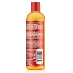 Creme of Nature textured hair shampoo close-up for curl-friendly cleansing.