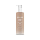 Cremo, botella de gel de ducha, experiencia envolvente para piel suave.