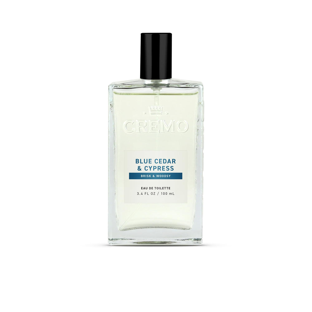 Cremo Blue Cedar and Cypress bottle front view highlights refined daily scent