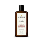 Cremo Bourbon & Oak bottle pour showing premium men's body wash