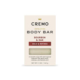 Cremo Bourbon & Oak exfoliating bar with lava rock smooths skin and buffs.