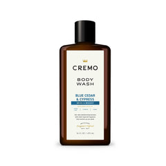 Cremo rich-lathering Cypress and Cedar body wash bottle delivers a luxurious cleanse.
