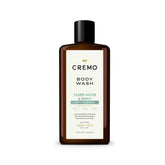 Cremo Silver Water and Birch body wash bottle on shelf for daily cleansing.