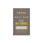 Cremo Vintage Suede body bar with lava rock closeup exfoliates for smoother skin.
